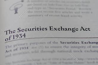 Focus on term Securities Exchange Act of 1934 printed in business law textbook on white page