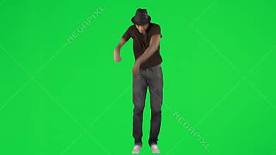 Ethnic young man dancing with a hat footage