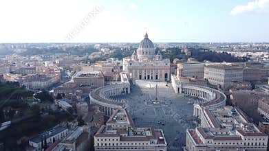 Drone shot of St. Peter's Basilica and the surrounding area of Vatican City.