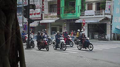 Exploring the bustling streets of Vietnam filled with scooters and motorbikes