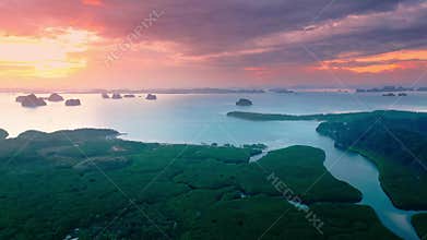 Dramatic Sunset Aerial Over Tropical Mangrove River And Islands In Krabi