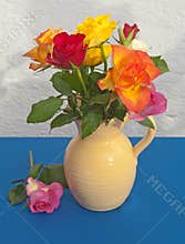 Roses in beige colored jug