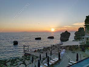 A peaceful sunset over the Gulf of Naples, a perfect end to a beautiful day.