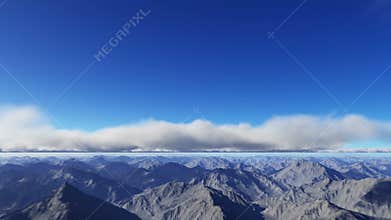Flying over the mountains and clouds