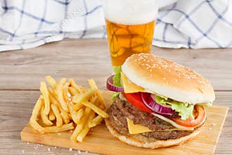 Burger with french fries and beer