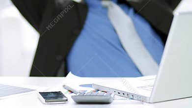 Happy businessman resting