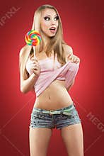 Glamourous girl holding lollipop
