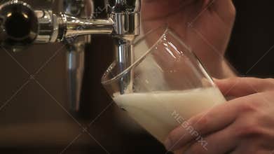 Pouring a pint of beer