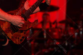 Male guitarist in a rock band