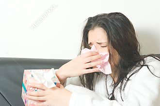 Sneezing woman