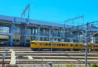 A local train parked outside Okayama station