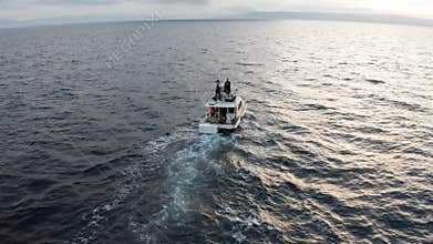 Fishermen on a boat sailing the Adriatic Sea