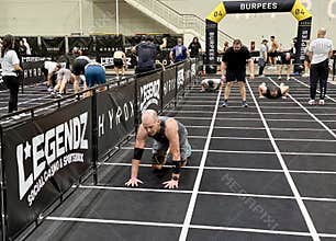 Athletes compete in burpee broad jump portion of Hyrox competition in November 2025 in Chicago.