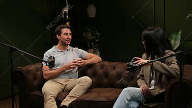 Influencers recording a podcast in a professional studio