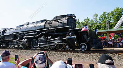 Pottstown, Pennsylvania, U.S.A - Jul 2, 2026 - Union Pacific Big Boy 4014 passing crowds photographing the locomotive near a