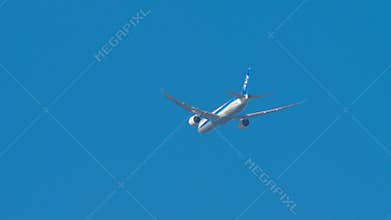 ANA Boeing 787-9 JA883A Climbs in Blue Sky