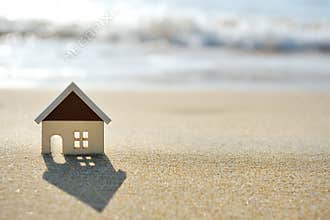 House on the sand beach near sea
