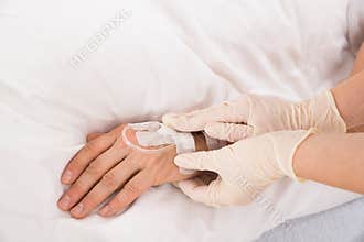 Iv drip in patient's hand