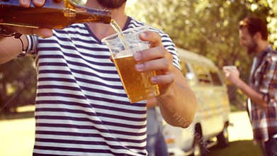 In high quality format hipster friends having a beer together