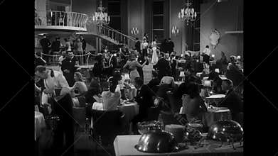 Panning shot of people at restaurant