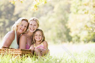 Grandmother with adult daughter and grandchild