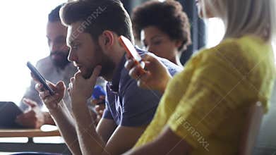 Business team with smartphones and tablet pc