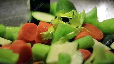 Woman cooking vegetables