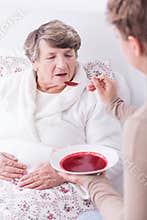 Helpful carer and ill senior