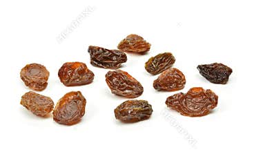 Black raisins on a white background