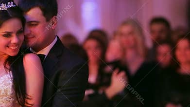 Bride and groom share their first dance together on their wedding day.