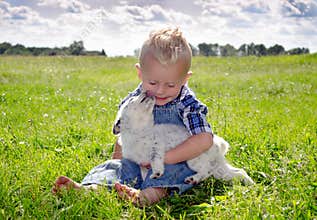 Summer loving boy and puppy