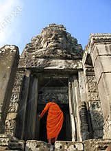 A monk enters Bayon Temple at Angkor Thom, Cambodia