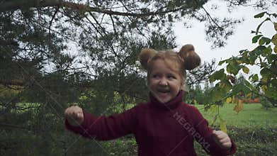 Happy and excited little girl outdoor