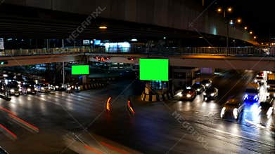 Traffic at night and advertising billboard