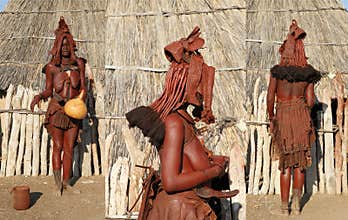 Portrait of a woman of the Himba ethnicity in three positions. Opuwo. Namibia.