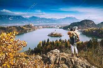 Traveling family looking on Bled Lake, Slovenia, Europe