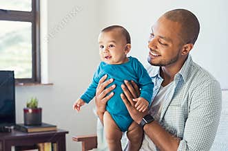 Father playing with baby