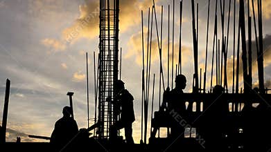 Construction worker silhouette on the work place