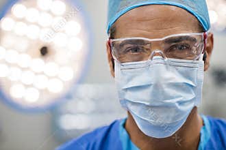 Surgeon with protective mask