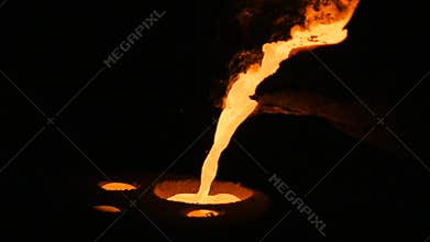 Red liquid metal flows and fills up special volume