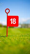 Red 18 hole golf flag