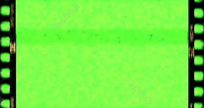 Vintage old grunge film strip frame with chroma key green screen