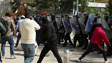 Protesters clash with riot gendarmerie during a riot-control exercise