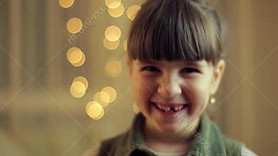 Girl smile into camera