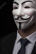 Anonymous activist hacker with mask studio shot