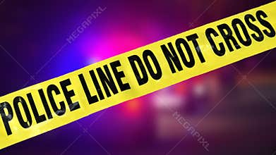 Police tape and bright lights