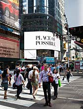 People crossing 7th Ave