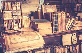 Antique books in antiquarian bookshop