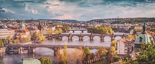 Prague, Czech Republic bridges skyline with historic Charles Bridge and Vltava river. Vintage