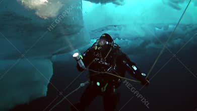 Scuba diving in Arctic at geographic North Pole.